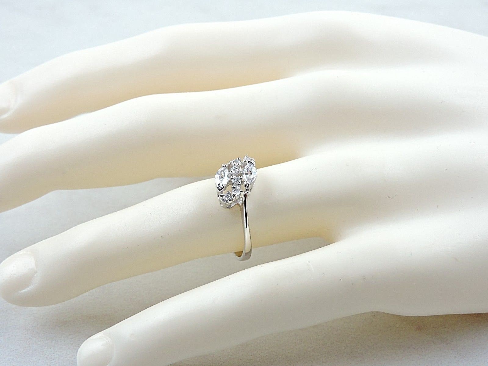 Sterling Silver .70 cttw Marquise And Round Cubic Zirconia Ring