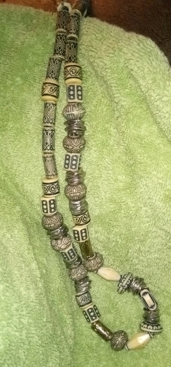 MULTIPLE FASHION BRACELETS MOST STRETCHY BUT SOME PRETTY ONES, SOME SIGNED BRASS