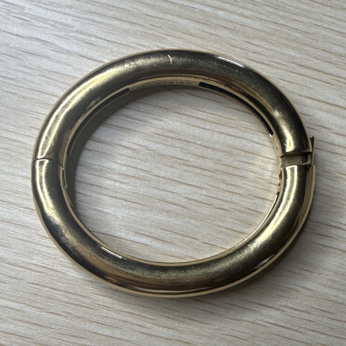 Jenny Bird Gold Tone Hinged Bangle Bracelet, Signed, No Stone
