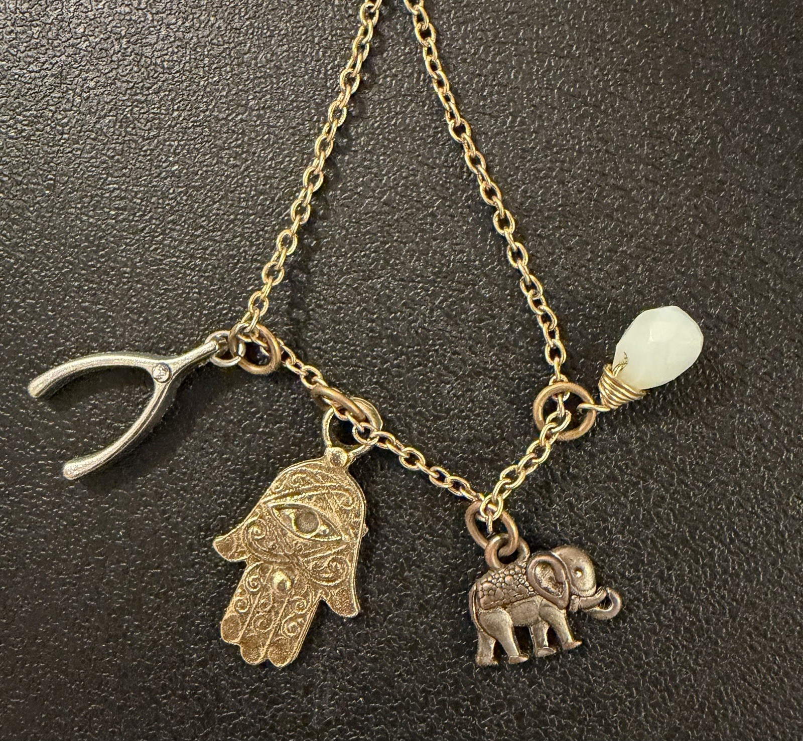 LEILA Jewelry Gold Tone Lucky Charm Necklace w/ Hamsa, Elephant & Wishbone 18in