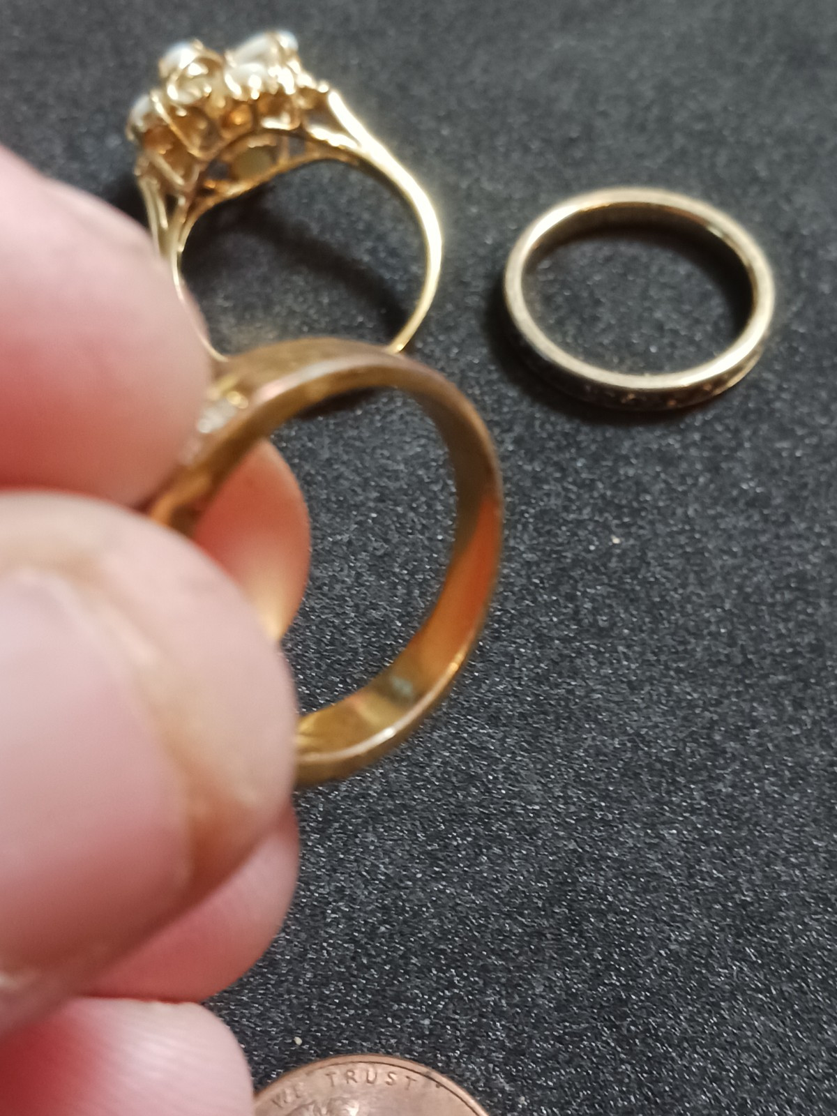 4 Beautiful Rings 3 with no markings 1 stamped M with a Trademark Nice