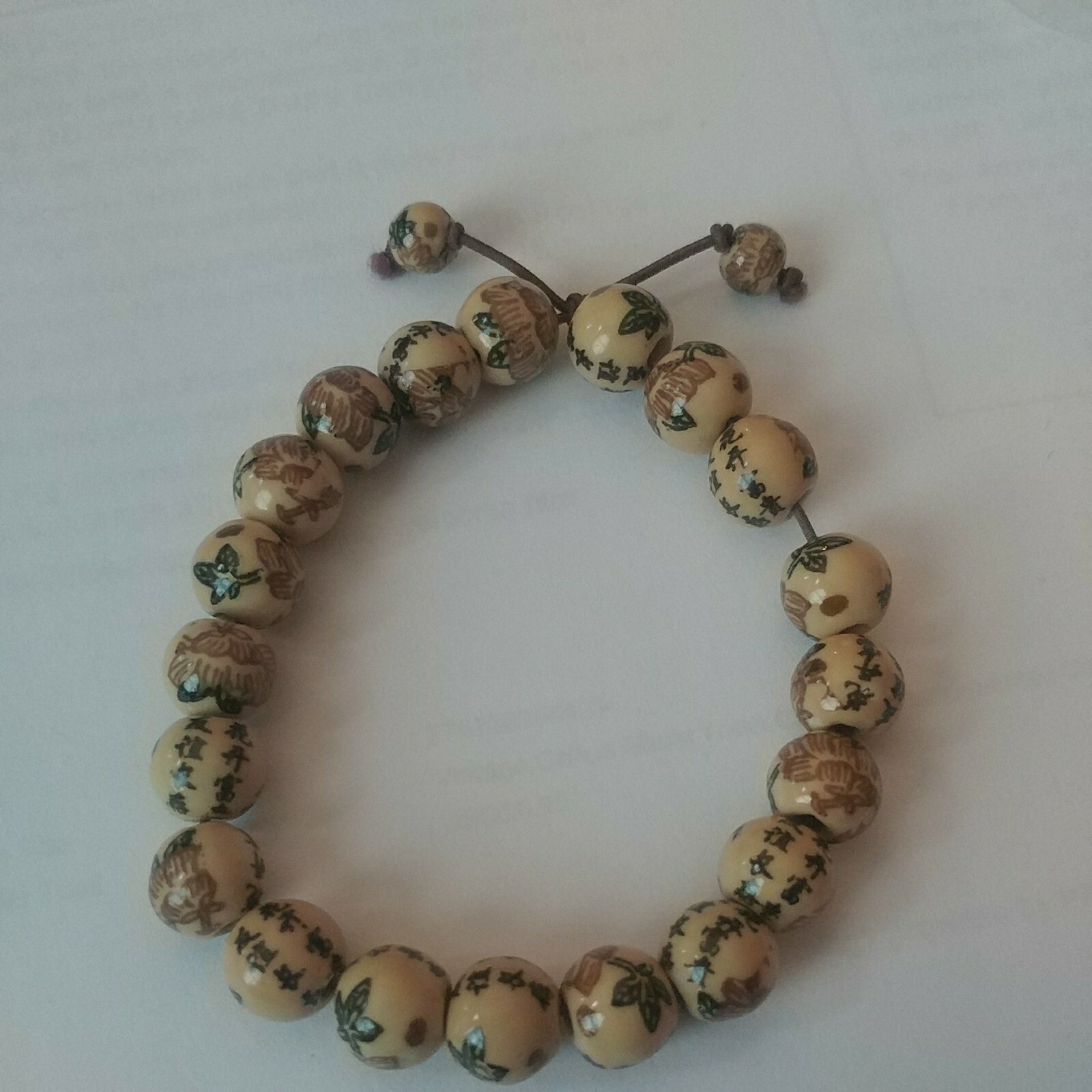 Oriental Beaded Bracelet-handmade-6″-elastic cord-tea motif-beige/brown
