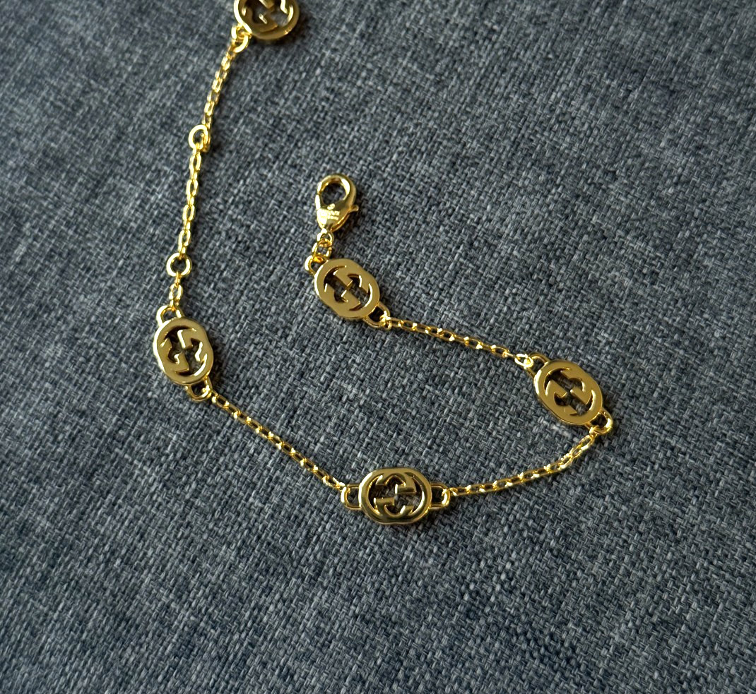 Gucci Gold Tone Chain Bracelet Interlocking GG Logo Bracelet Jewelry Designer