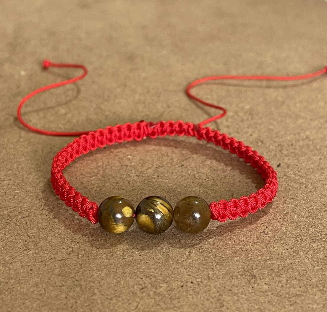 Pulsera Roja Ojo de Tigre para la proteccion general de la vida. Año Del Tigre