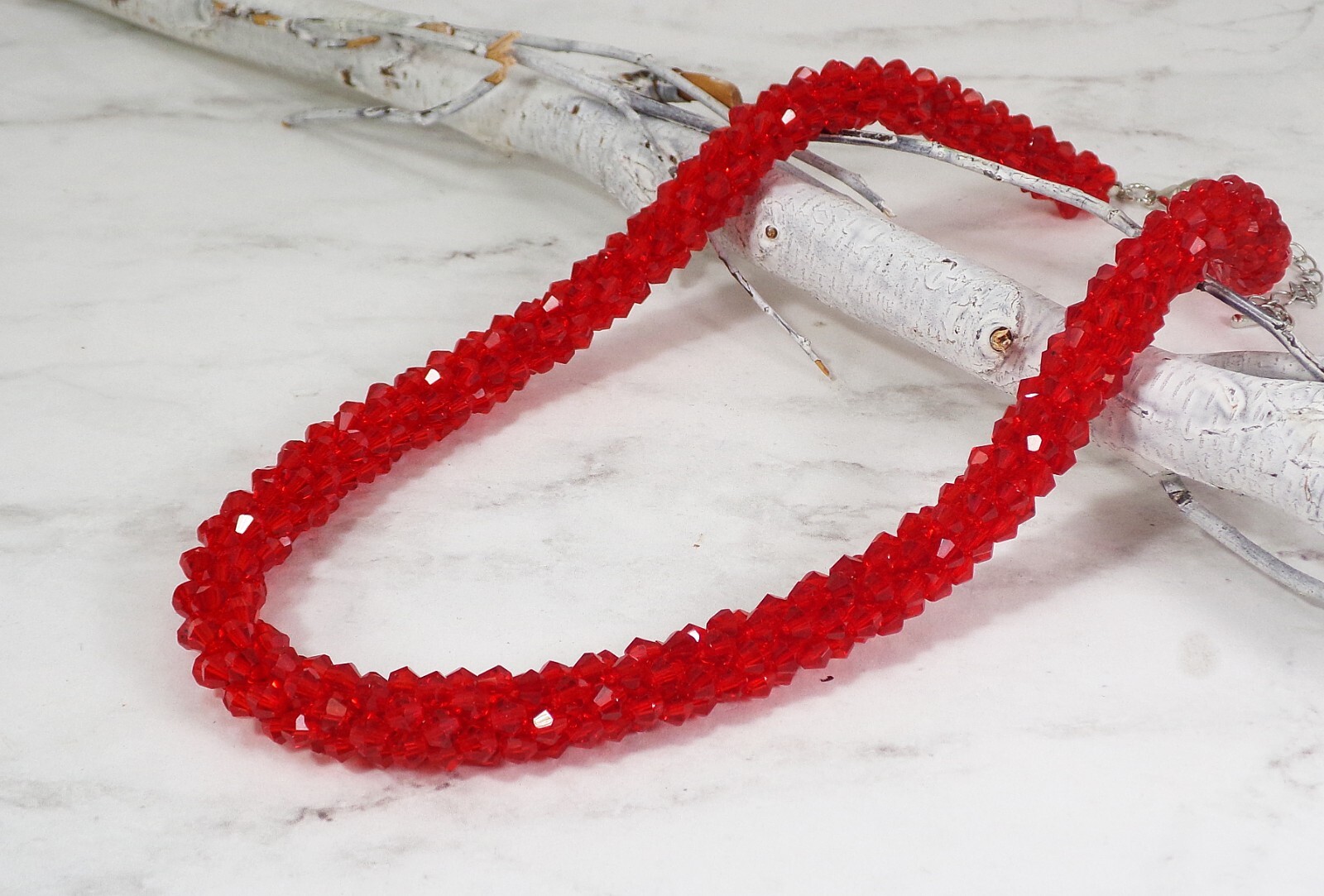 Red glass beaded necklace in a sparkling thick cluster beaded rope design New
