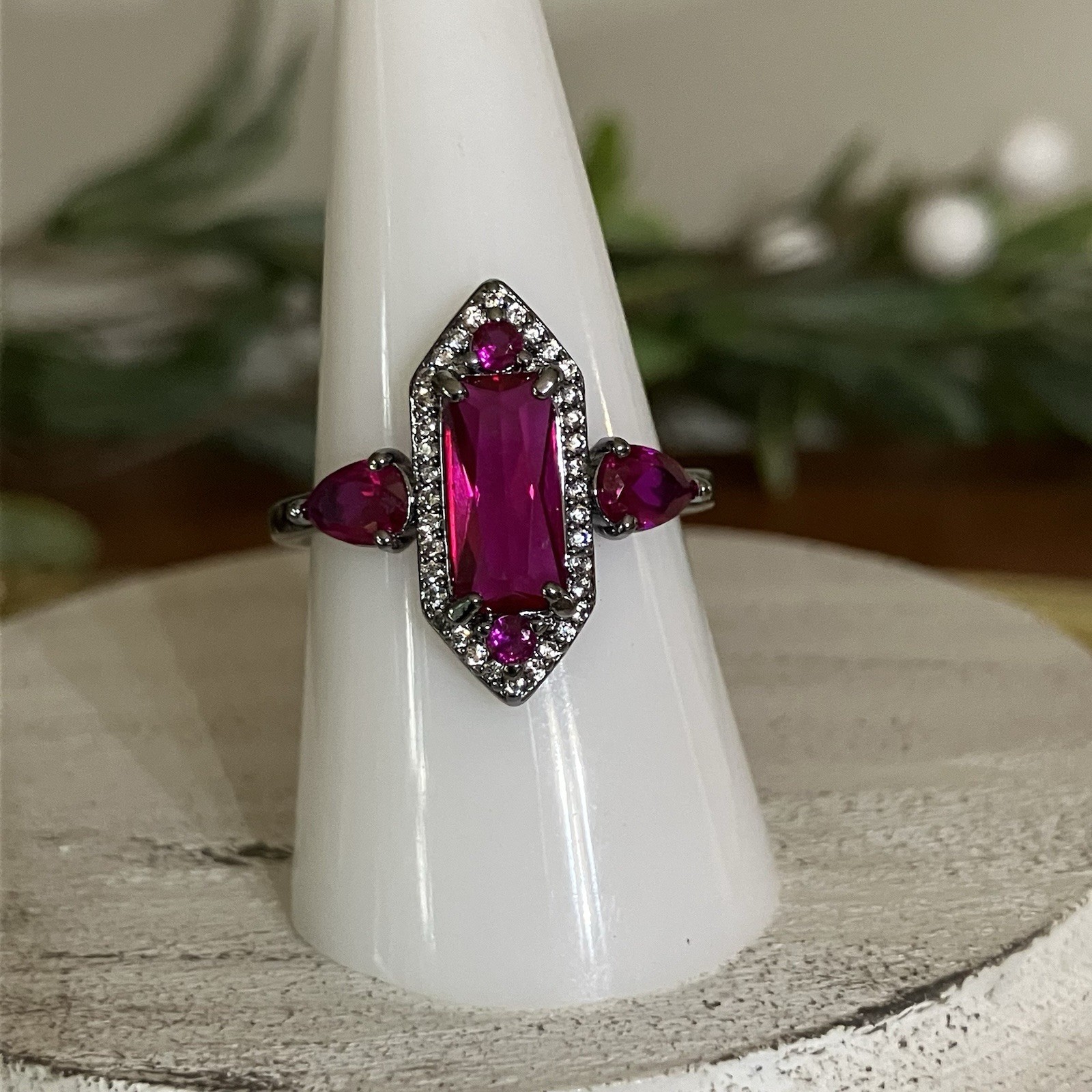 Bomb Party “The Calliope Ring” Lab Ruby Hematite Plating July 2026 RG43302 Sz 9