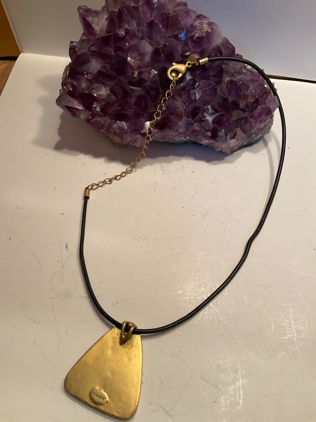 chico vintage ombré orange and red triangular pendant on a black cord