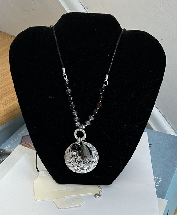 1946 “She Laughs Without Fear of the Future” silver tone long Pendant necklace