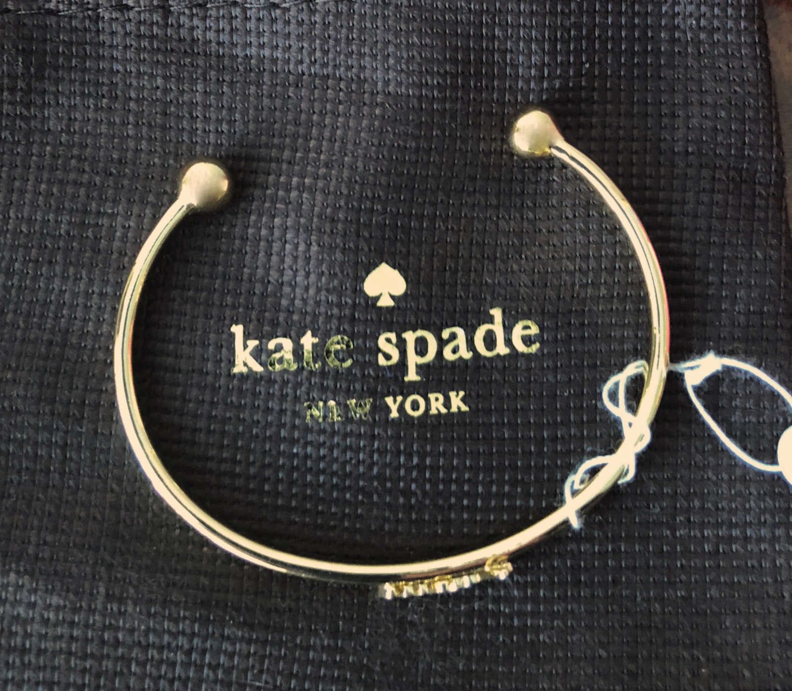 Kate Spade 2018 Say Yes Cursive WINK Yellow Gold Plate Skinny Open Cuff Bracelet