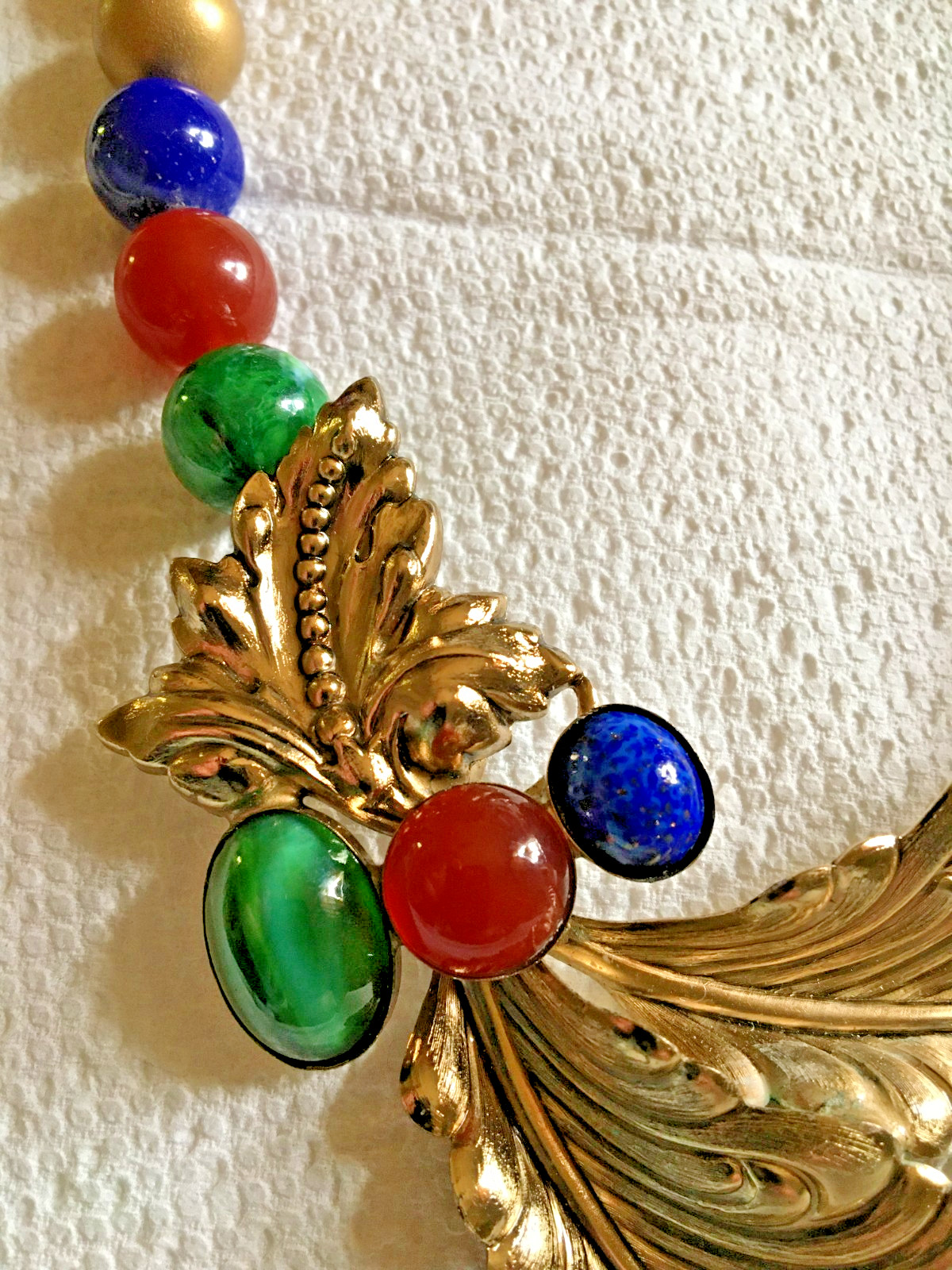 Ornate 18″ Necklace Golden + Stamped Metal Feathers? + Drilled Glass Beads