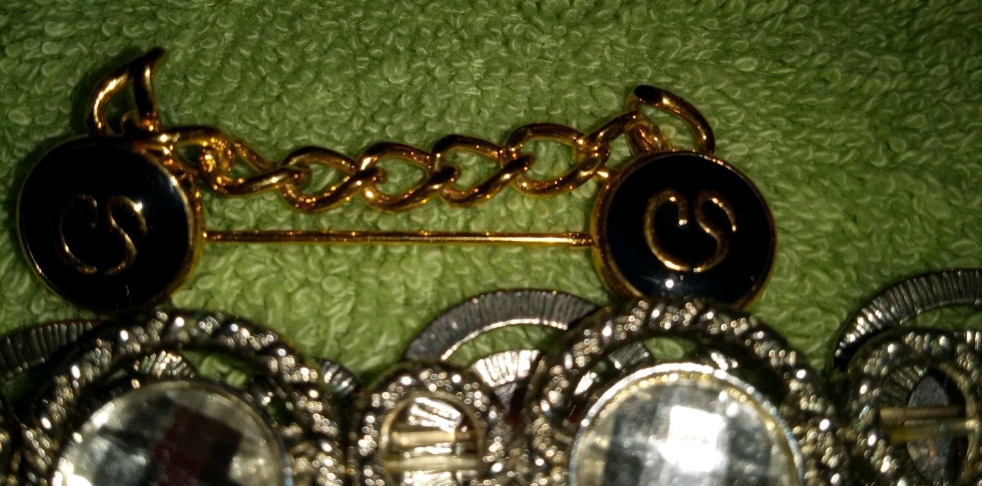 MULTIPLE FASHION BRACELETS MOST STRETCHY BUT SOME PRETTY ONES, SOME SIGNED BRASS