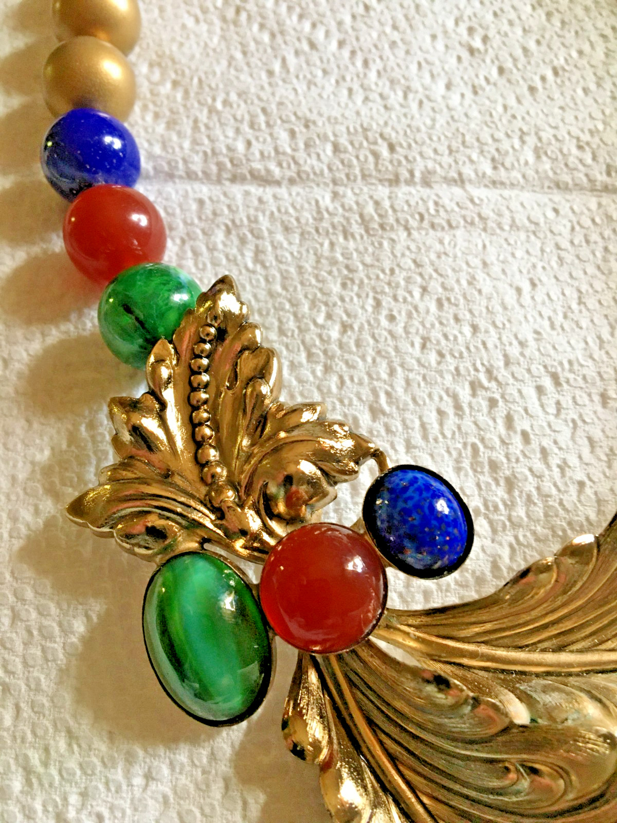 Ornate 18″ Necklace Golden + Stamped Metal Feathers? + Drilled Glass Beads