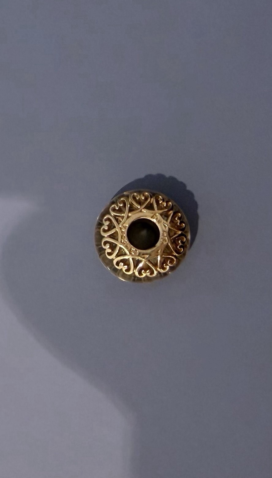 Pandora glitter glass rose gold charm.