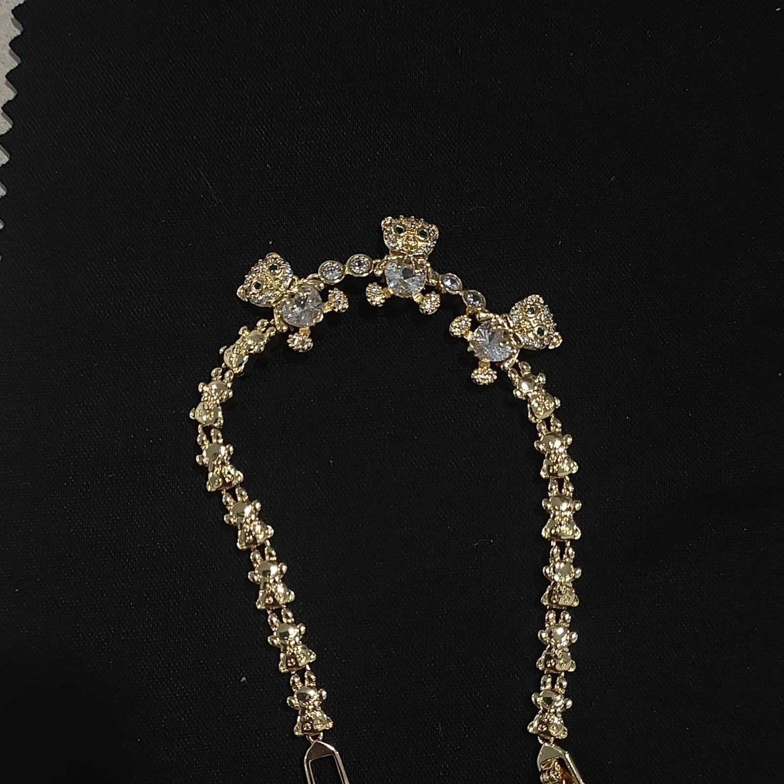 Women’s gold-plated bracelet with a teddy bear charm