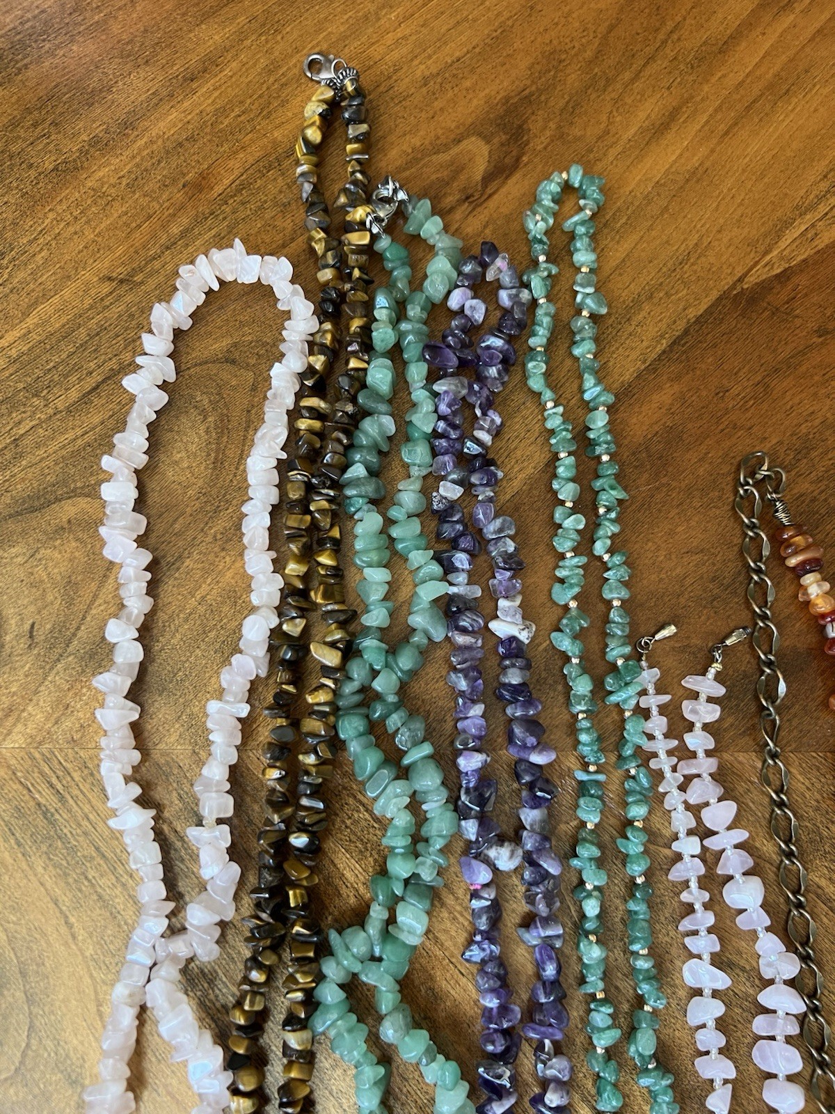 Spectacular lot of natural stone necklaces in pink, green, and brown