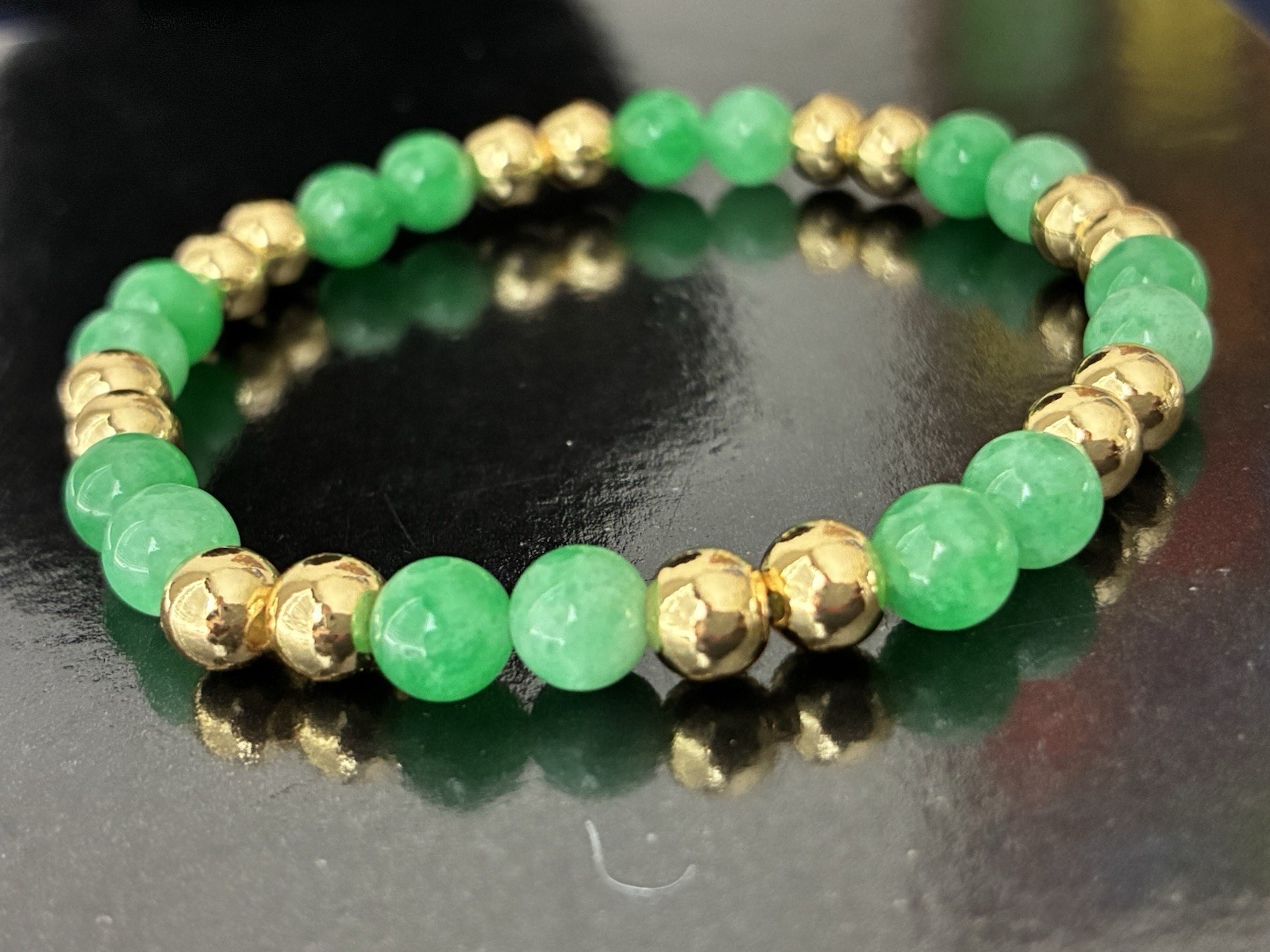 Green Stone Round Beaded Stretch Bracelet Gold Tone Spacer Beads