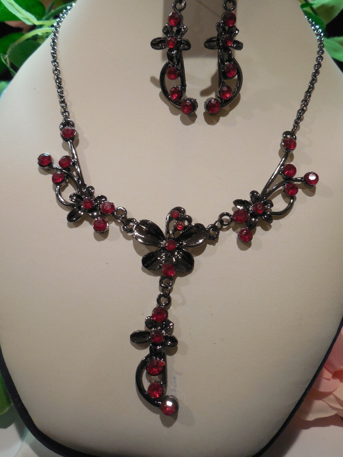 Ion Plated Black Stainless Steel Ruby Red Rhinestone Floral Necklace Set