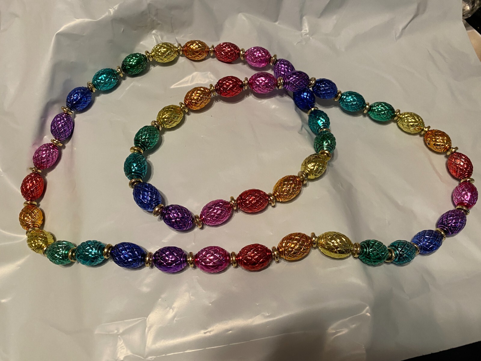 Beaded Necklace about 45 Inches long Pre owned in very good condition.