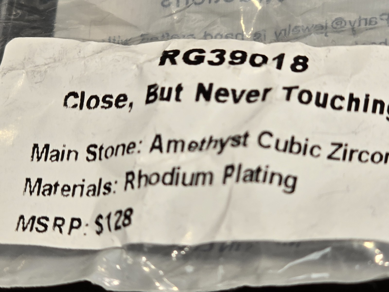 Ring Bomb Party February 2026 8 RG39018 “But Never Touching” Rhodium/Amethyst