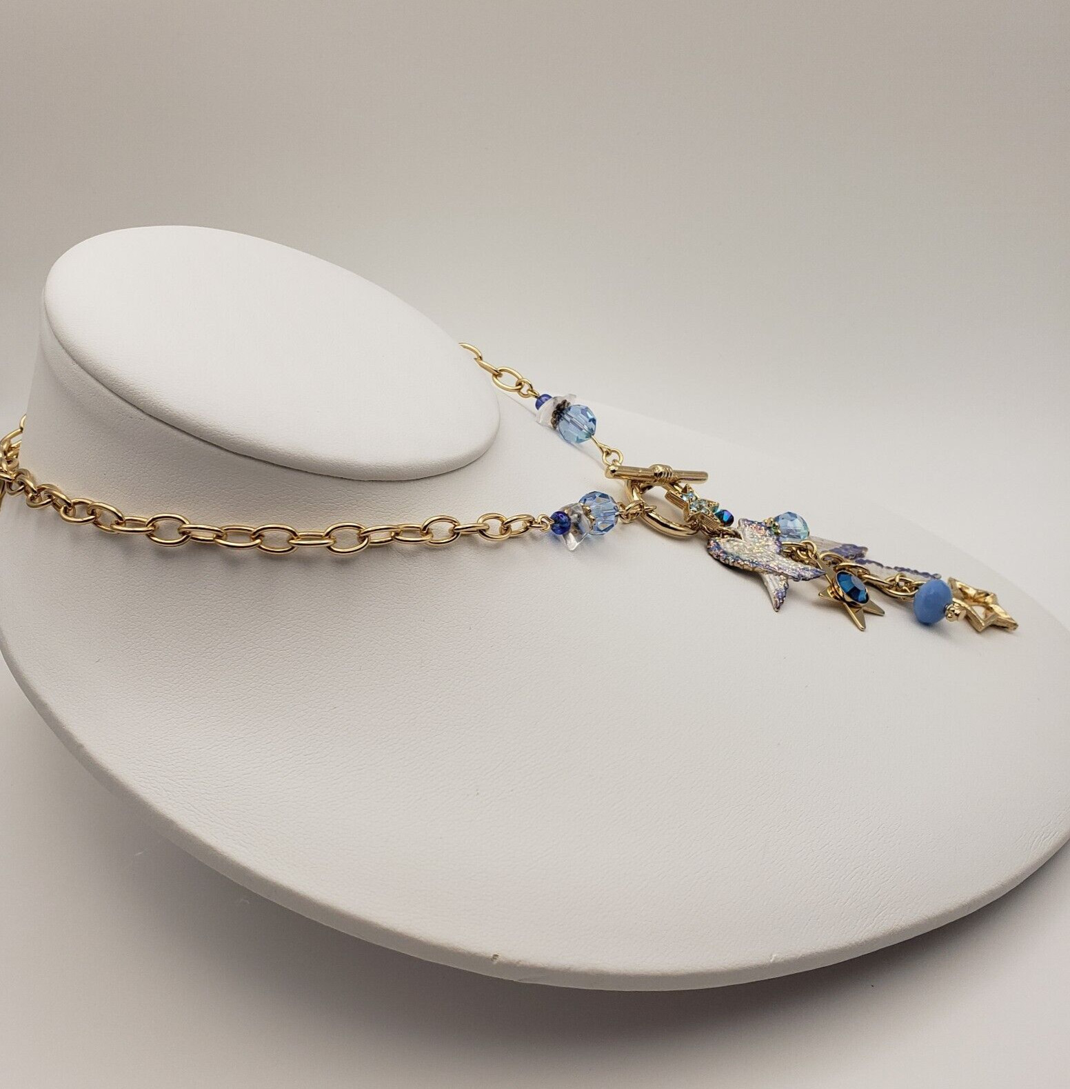 Kirks Folly Forever Angel Wings Charm Necklace Gold Tone 17in Long Blue Crystals