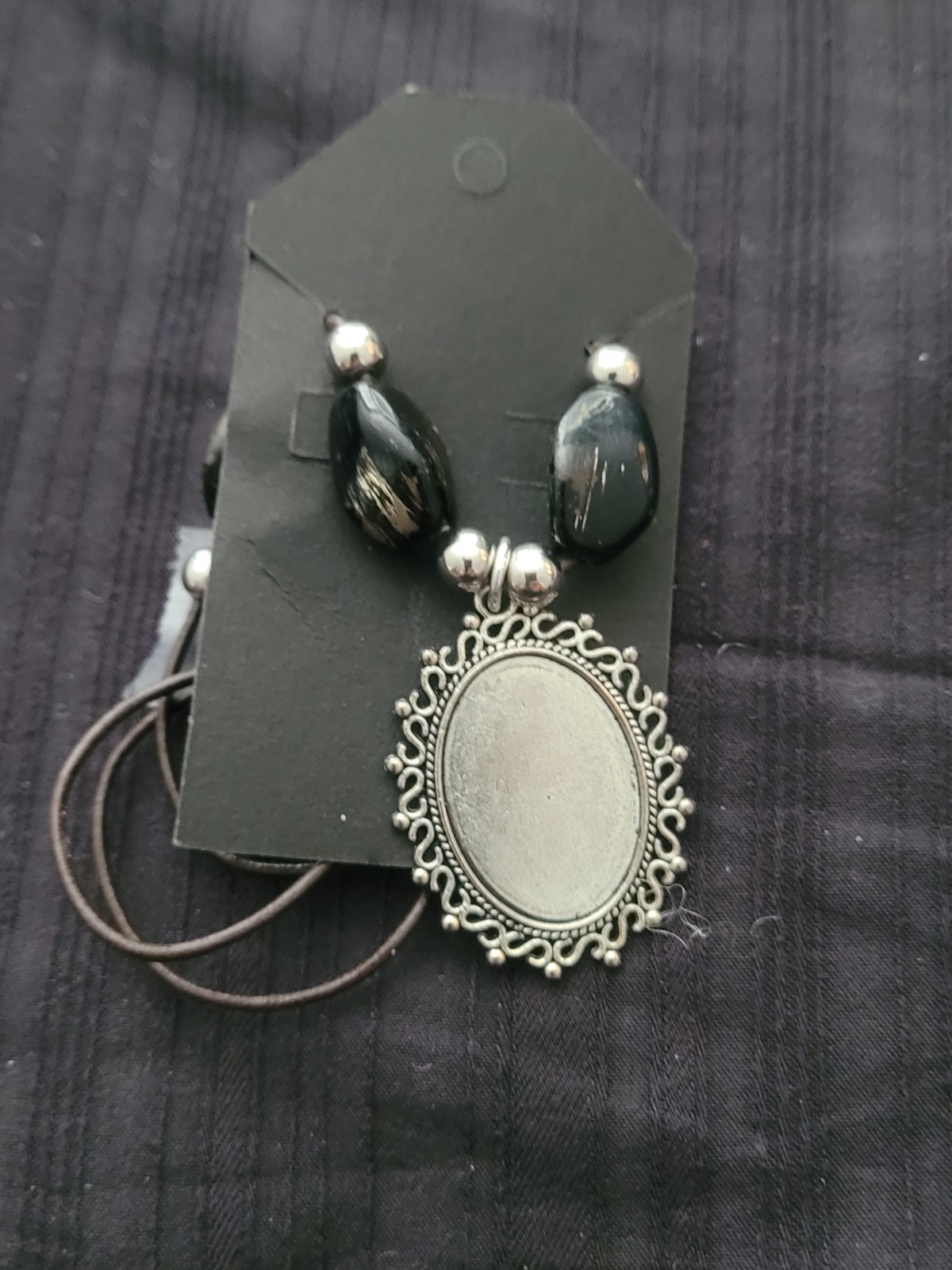 Silver Tone Blank Oval Pendant On A Cord Necklace, Black And Silver Beads