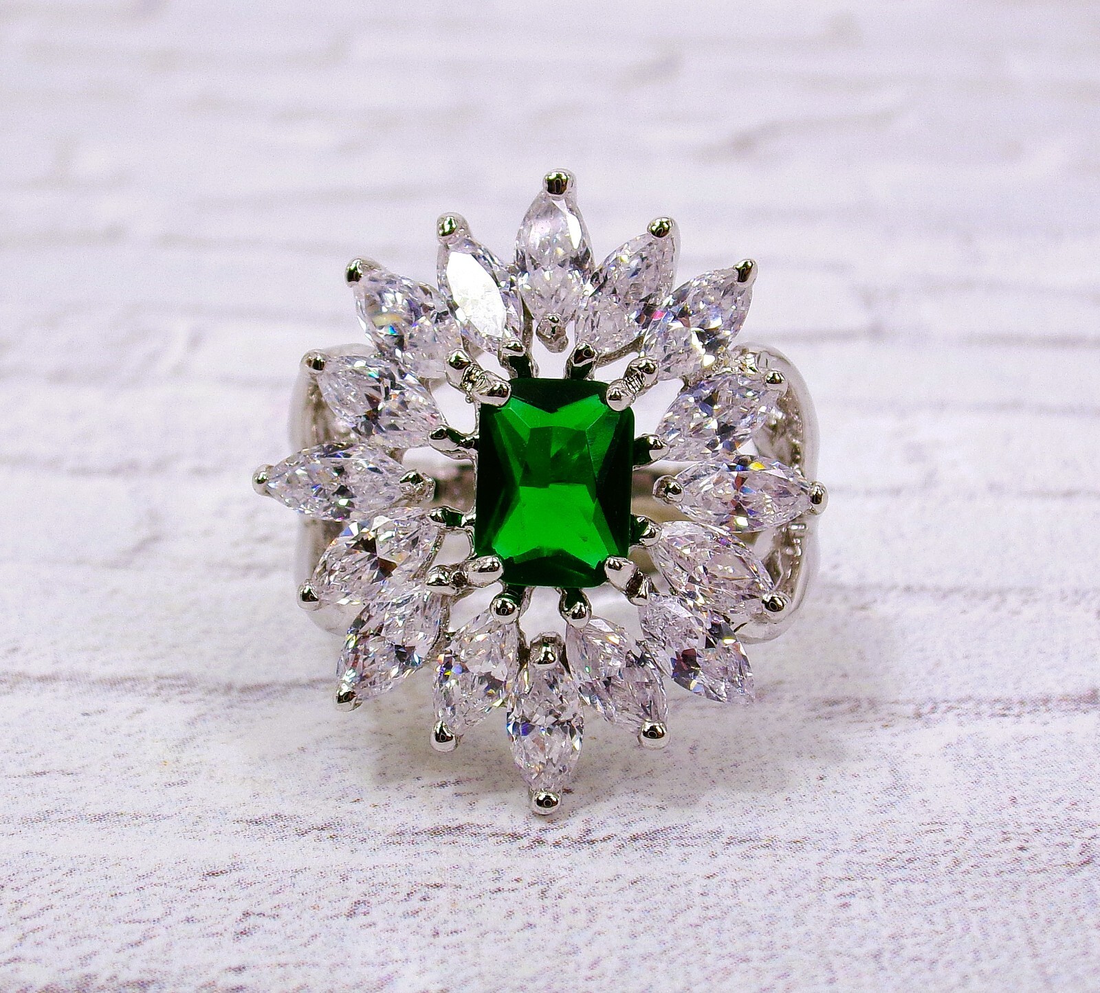 Green rectangle cubic zirconia stone ring, clear marquise stones all around SZ 8