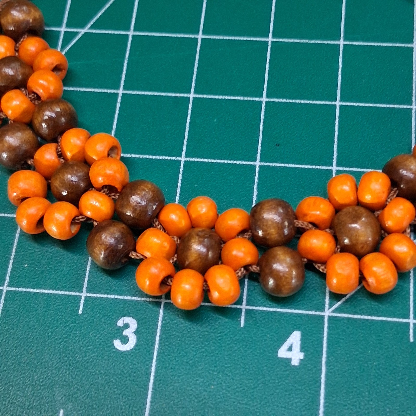 Orange & Natural Wood Channel Set Bead Adjustable Size Brown Cord Bracelet