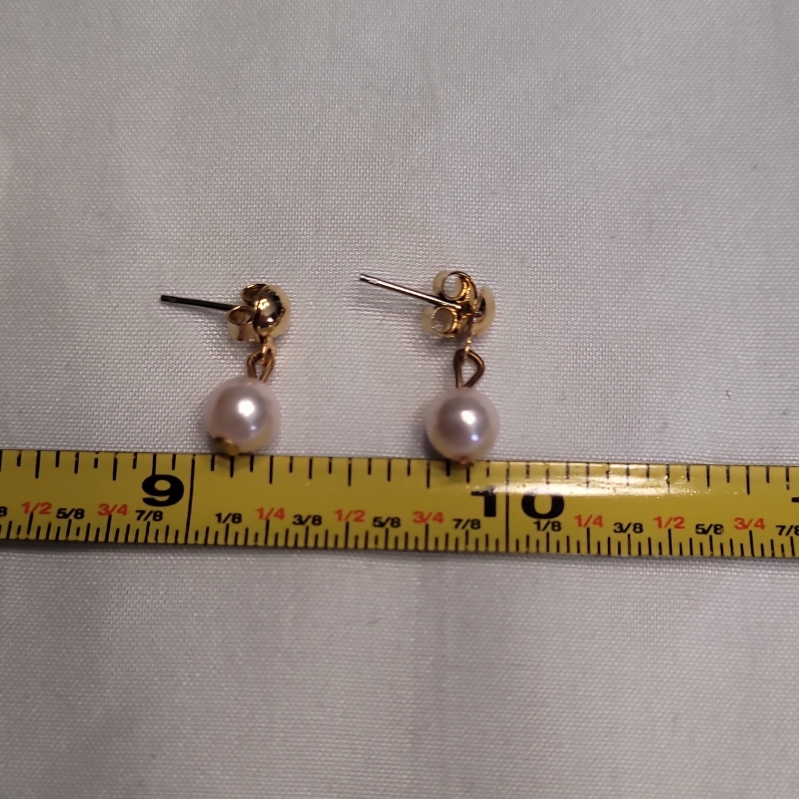Pink cultured freshwater pearl necklace and earring set with gold-tone clasp