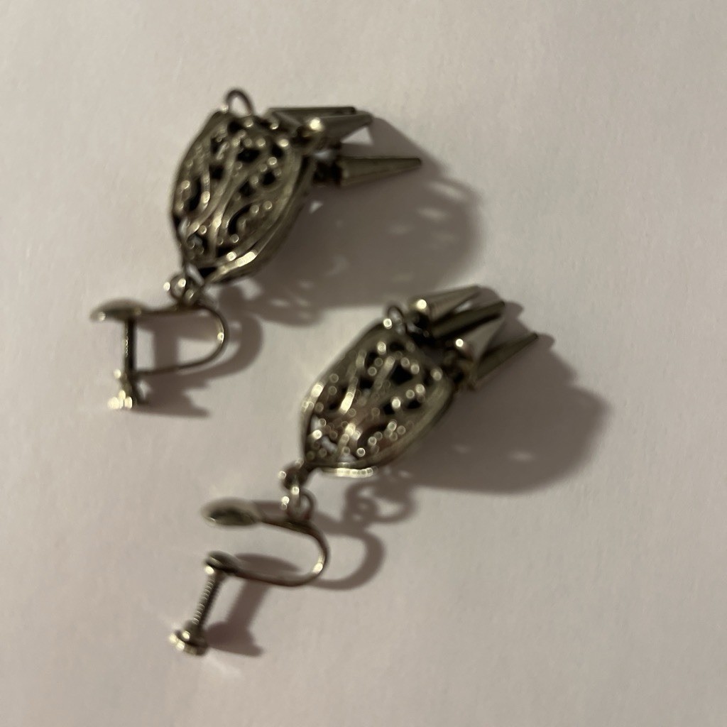 Silver Tone Earrings With Filigree Design And Dangling Spike