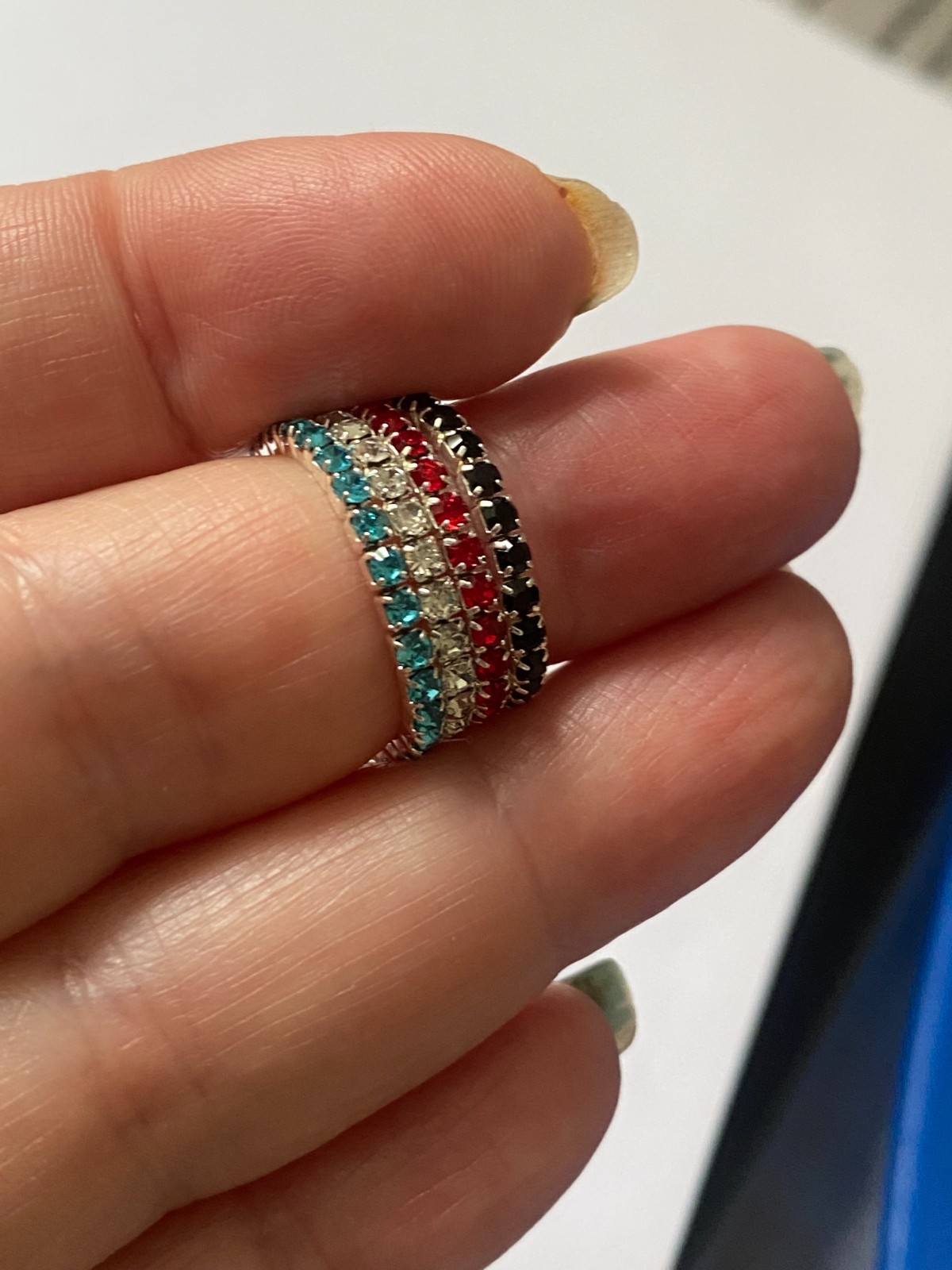 5 stretchy bracelets and 4 stretchy rings, shiny and new