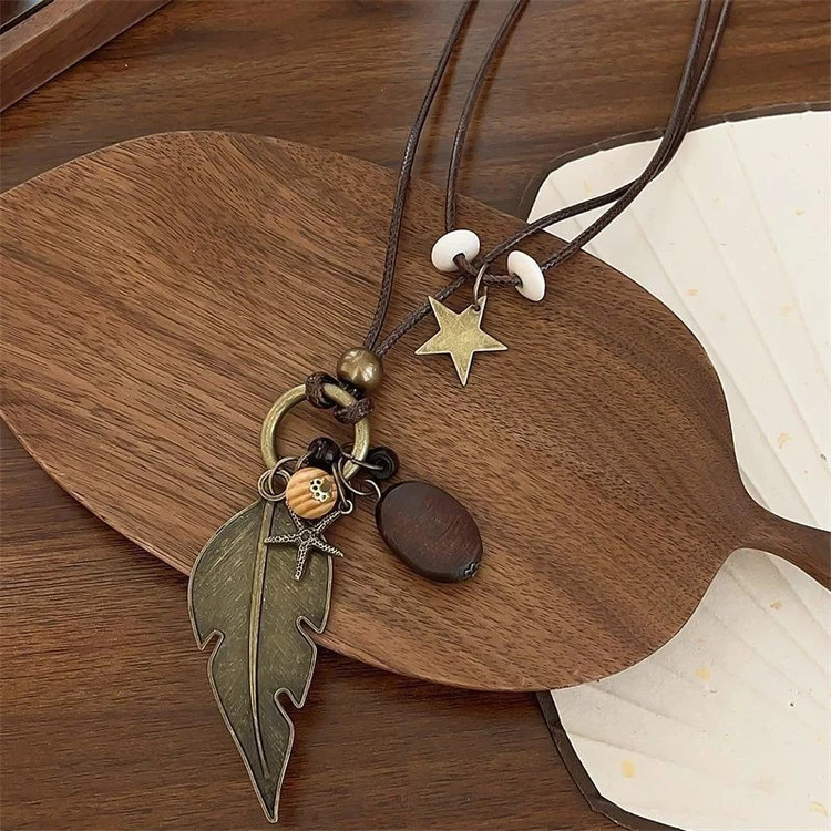 7Pcs Bohemian Women’s Necklace Set – Layered Cord Necklaces with Feather