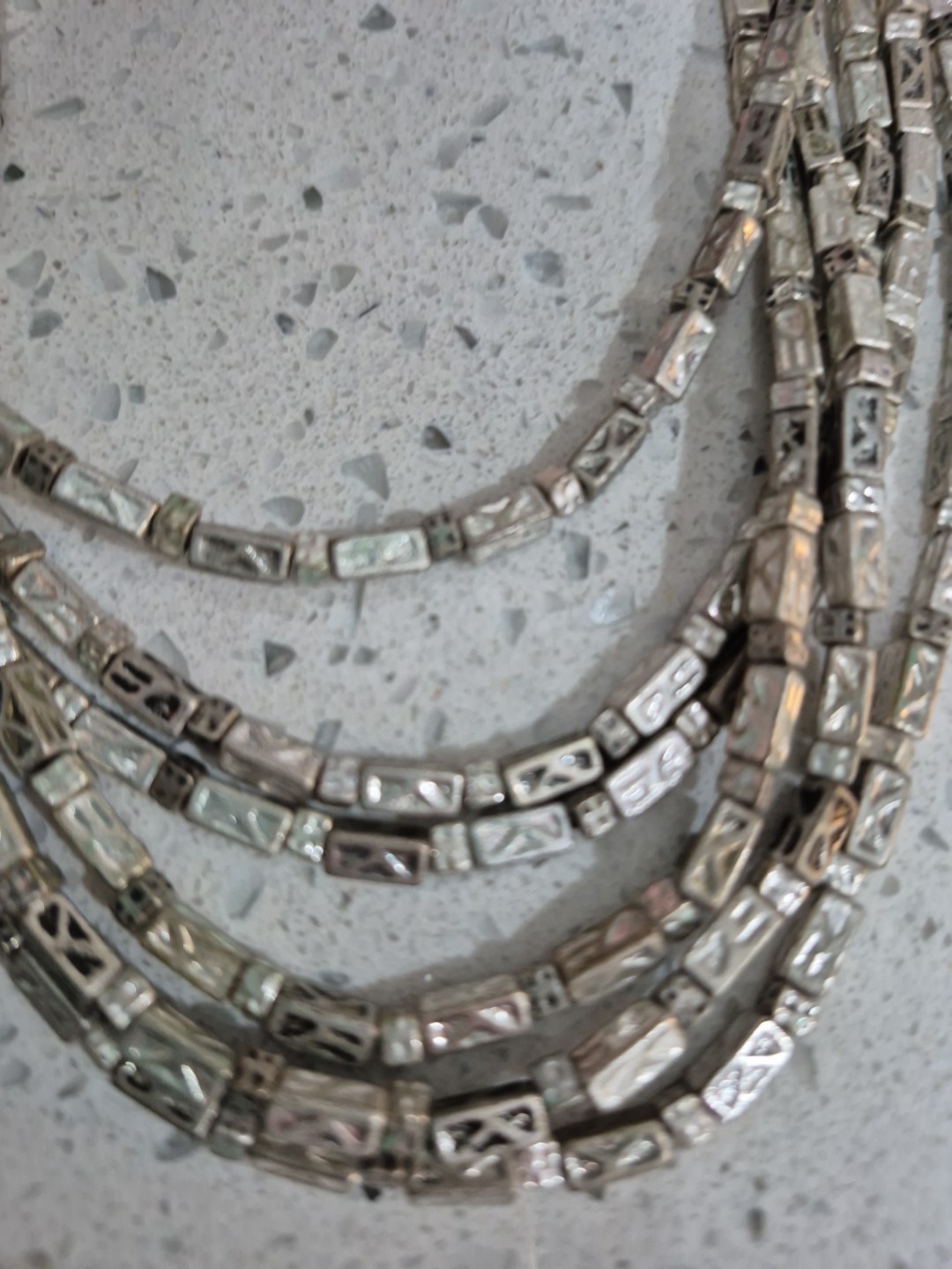 Beautiful strand of metal beads a timeless piece. dress it up or down heavy