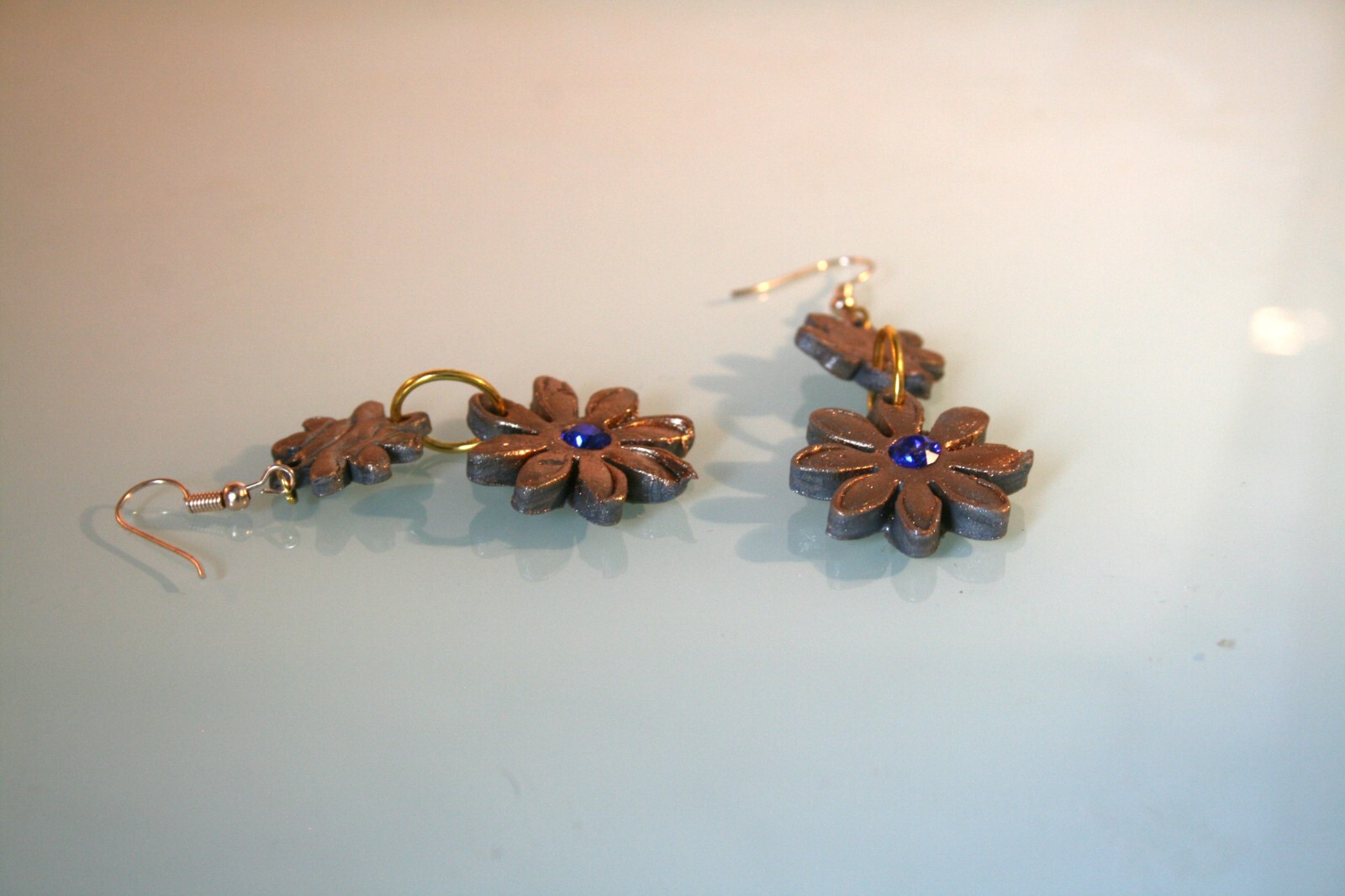 Gold tone golden & gray daisy, blue crystal polymer clay dangle earrings 2 1/2″