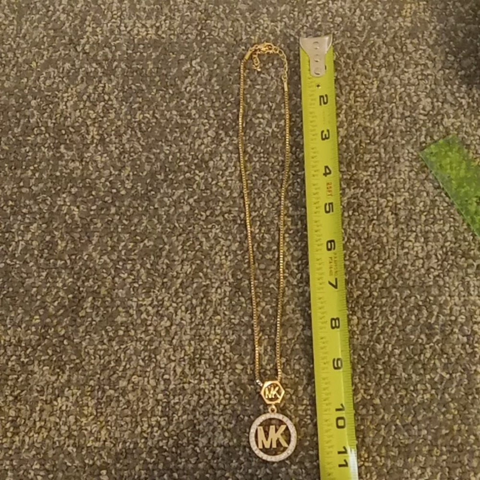 MK rhinestone and gold tone chain women’s necklace