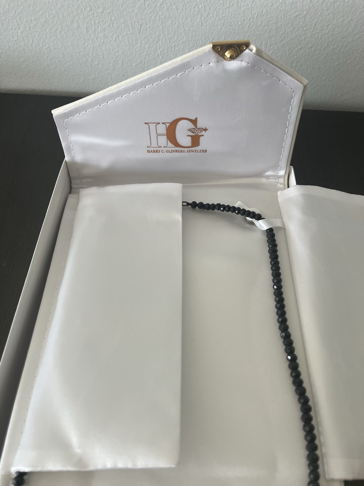 Black Spinel Faceted Bead Necklace Harry C. Glinberg Jewelers White Leather Box
