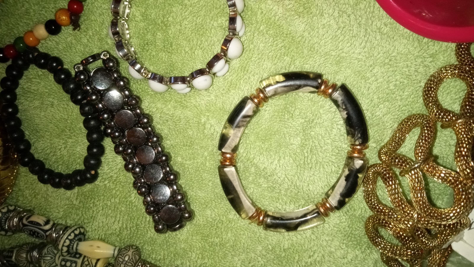 MULTIPLE FASHION BRACELETS MOST STRETCHY BUT SOME PRETTY ONES, SOME SIGNED BRASS