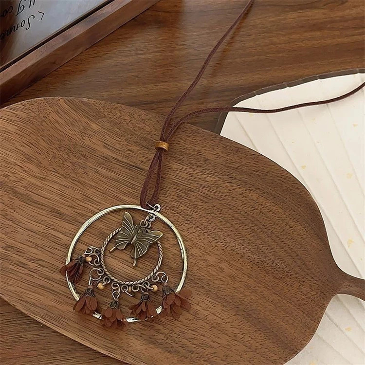 7Pcs Bohemian Women’s Necklace Set – Layered Cord Necklaces with Feather