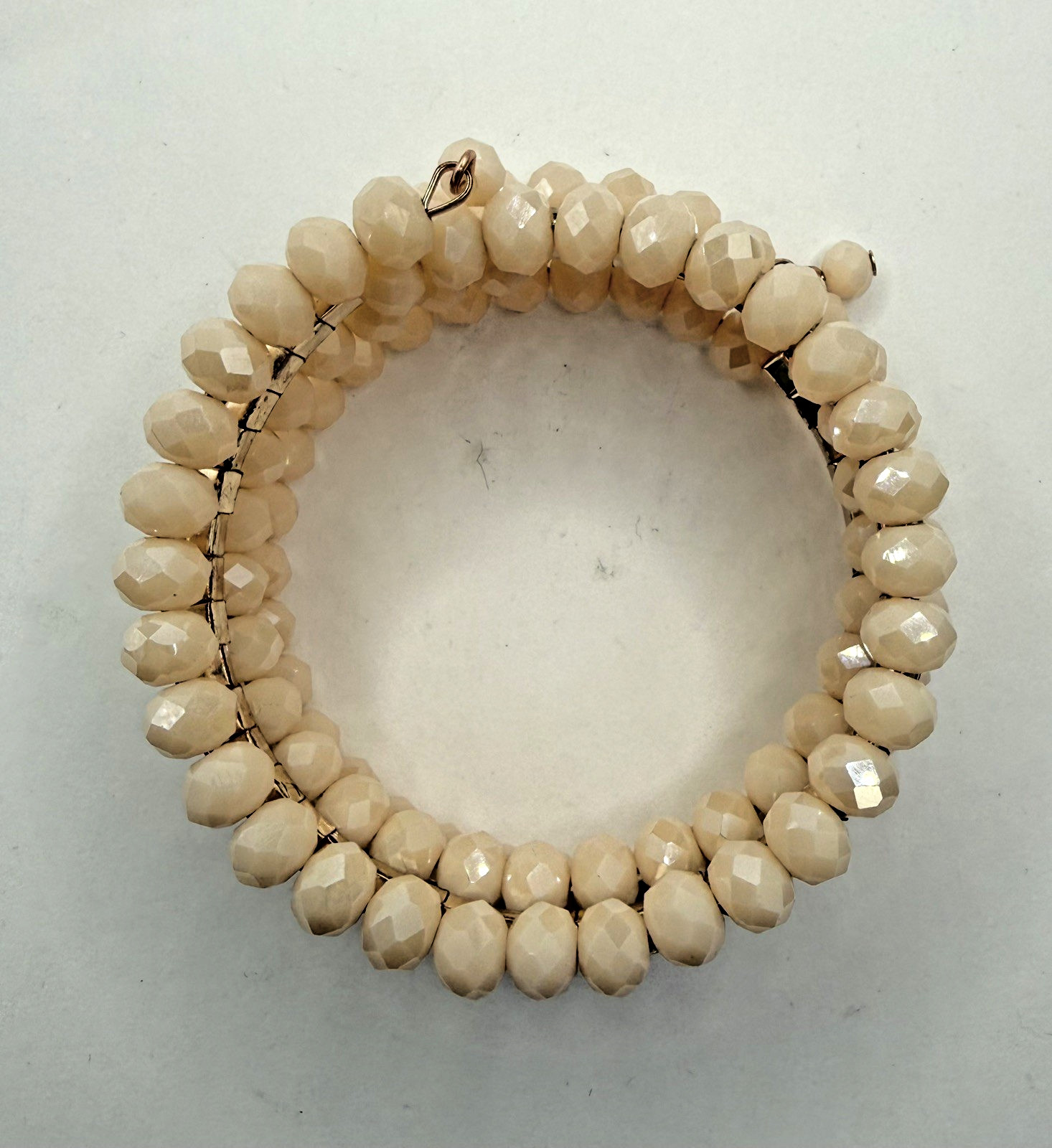 5 row crystal and gemstone coil layered bracelet 1 stone missing INC in box