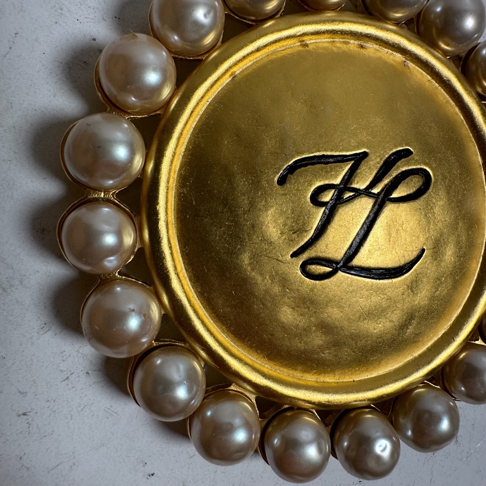 Vintage Karl Lagerfeld Logo Faux Pearl Surround Gold Tone Fashion Brooch Pin