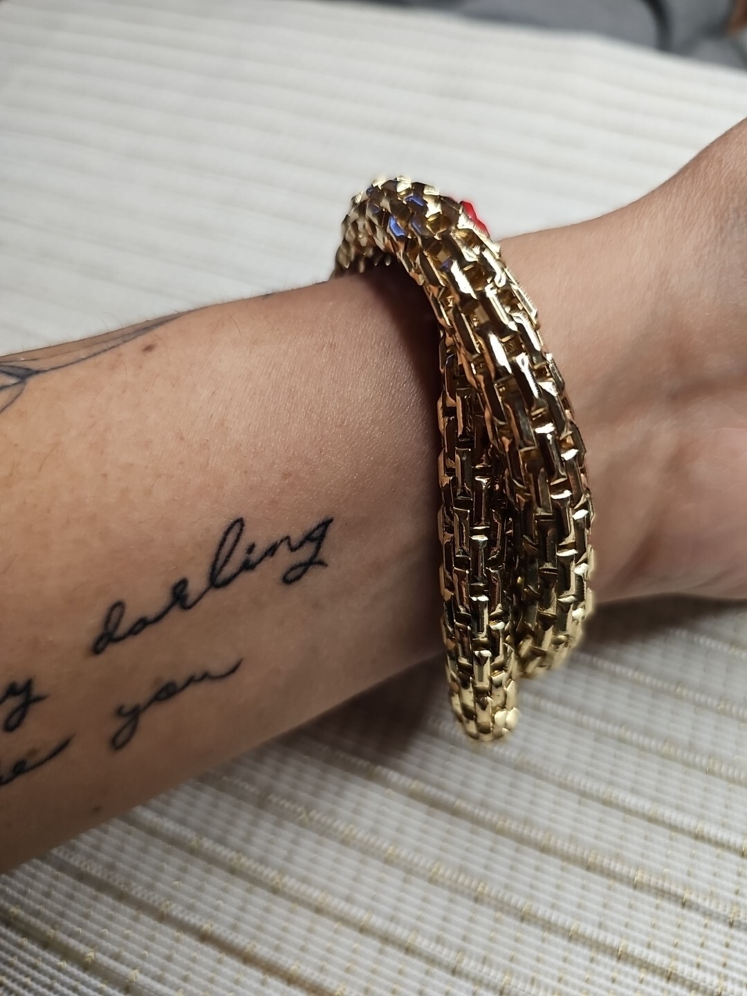 Branded Twisted Pair Of Bangles