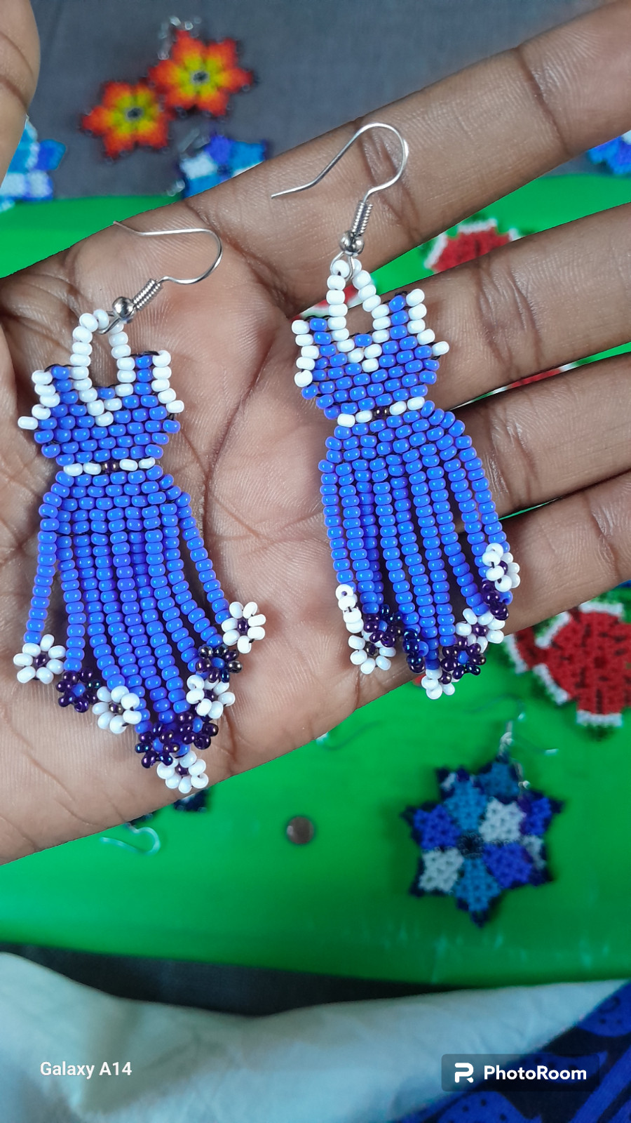 42 BEADED HANDMADE BRACELETS AND 28 PAIRS OF BEADED HANDMADE EARRINGS(LOT OF 70)