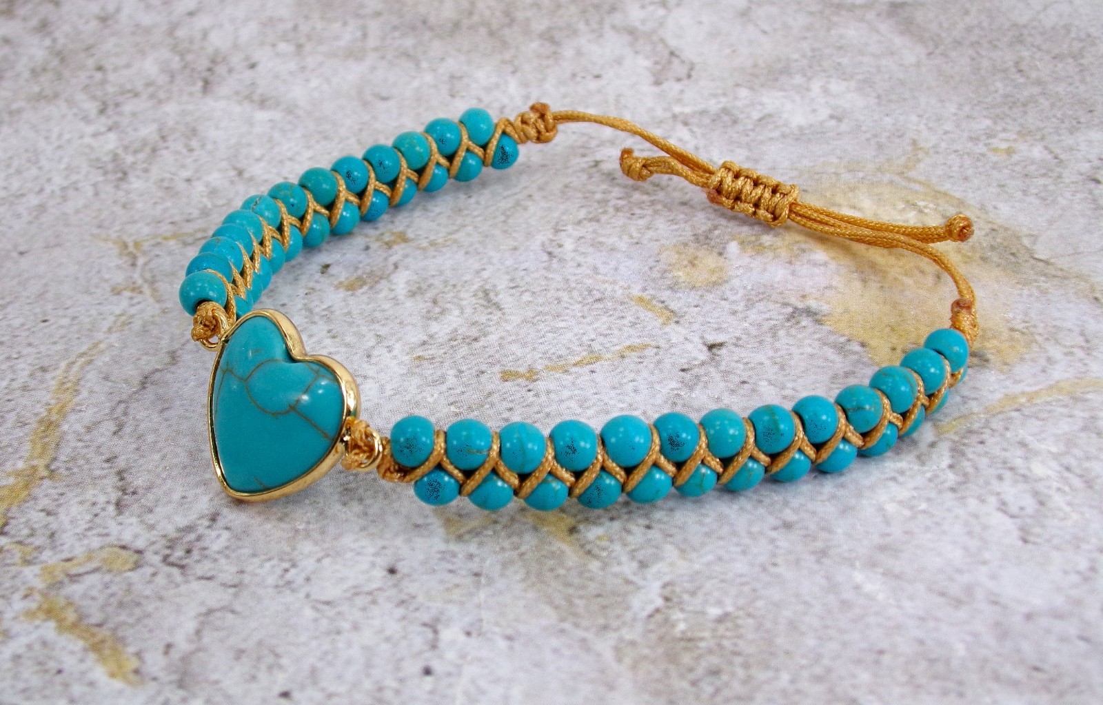 Turquoise stone heart bracelet with all round stones brown cord adjustable New