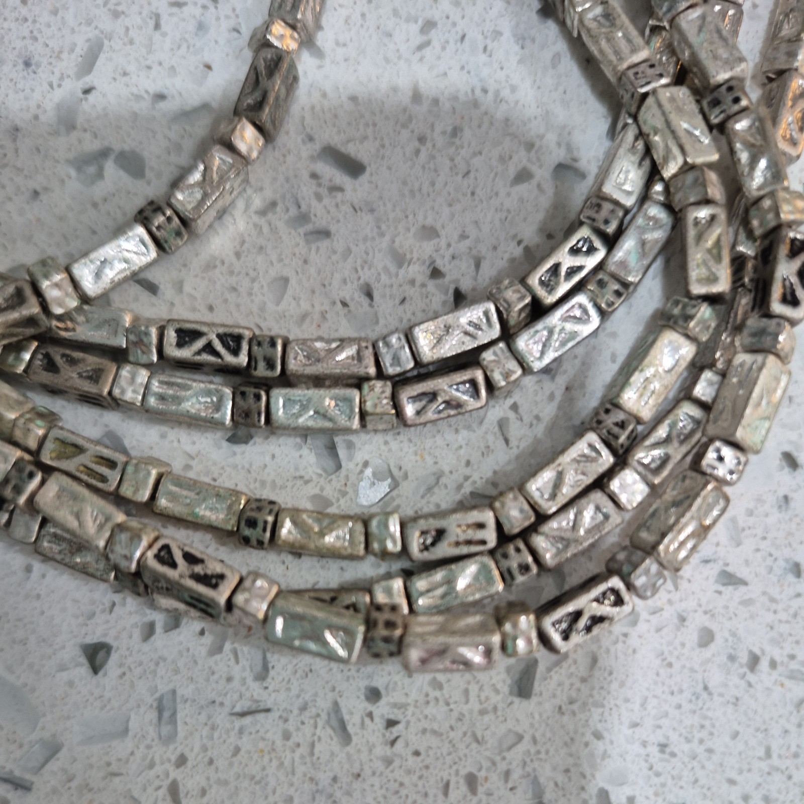 Beautiful strand of metal beads a timeless piece. dress it up or down heavy