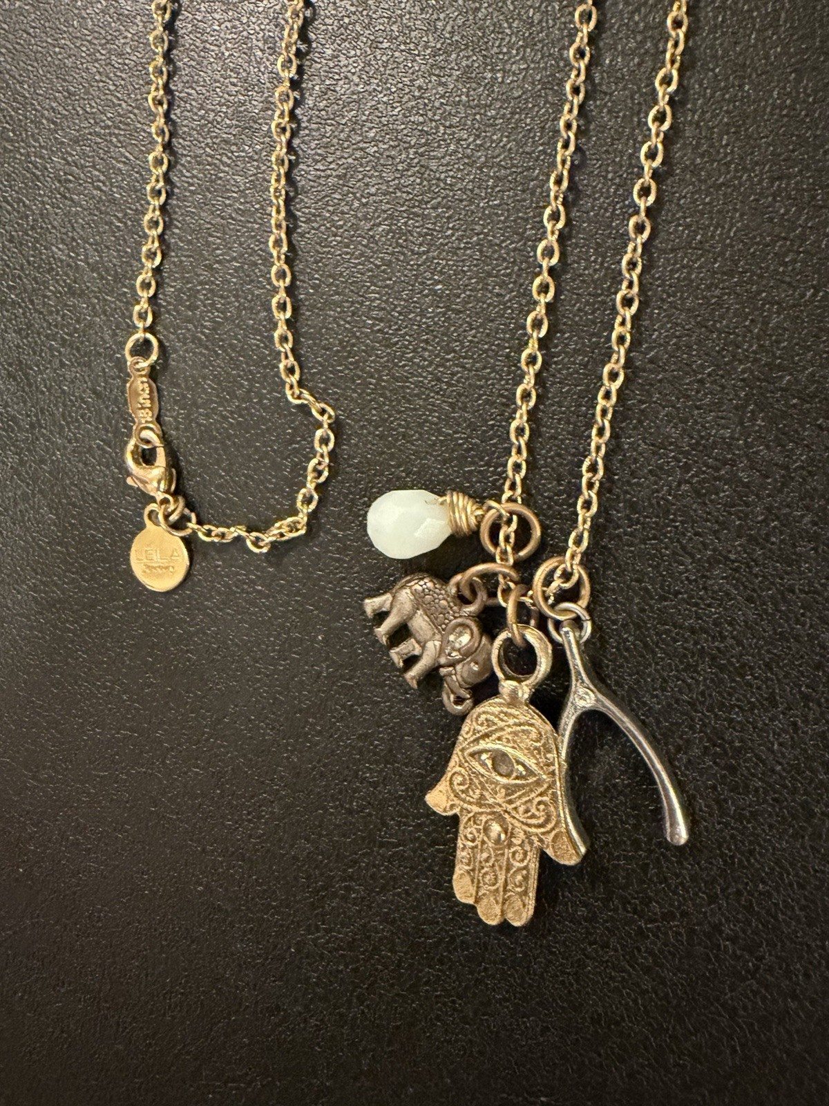 LEILA Jewelry Gold Tone Lucky Charm Necklace w/ Hamsa, Elephant & Wishbone 18in