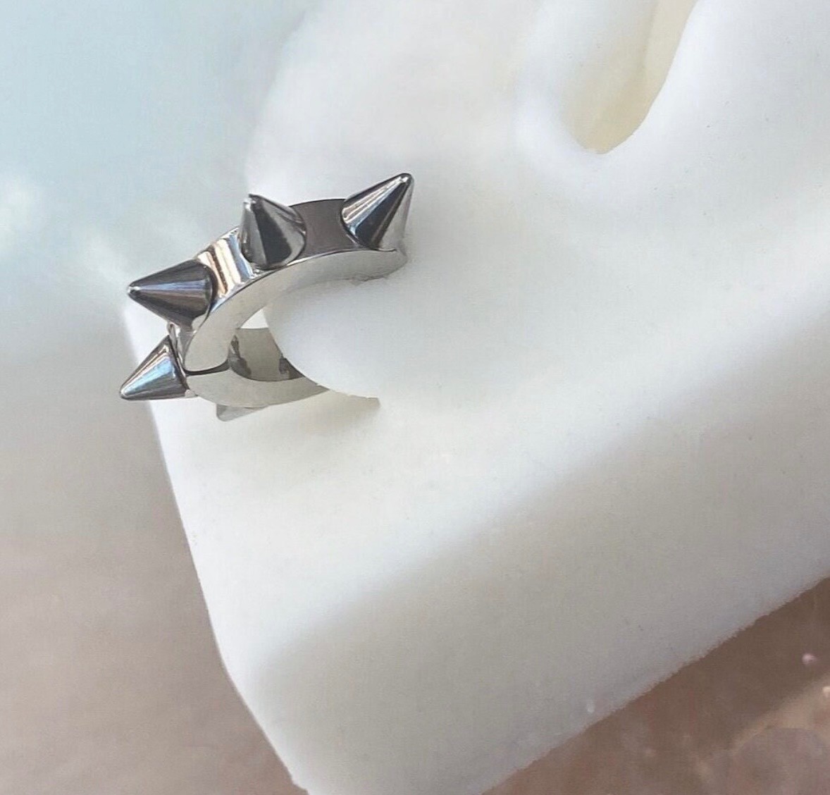 Silver Titanium Spike Huggie Hoop Earrings.