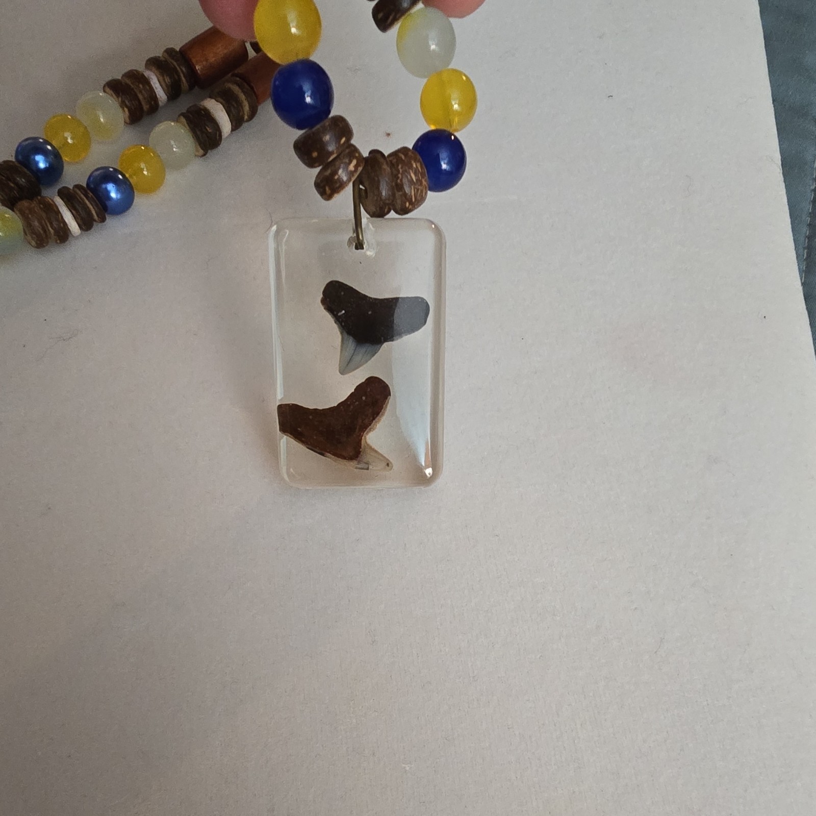 Beaded Necklace with Resin Shark Tooth Pendant, Glass And Coconut Shell Beads