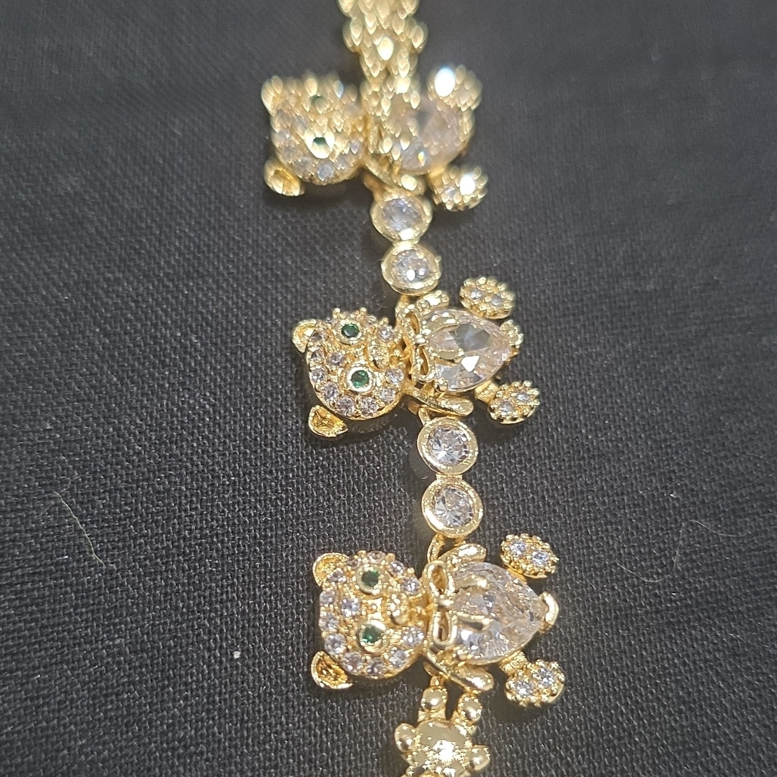 Women’s gold-plated bracelet with a teddy bear charm