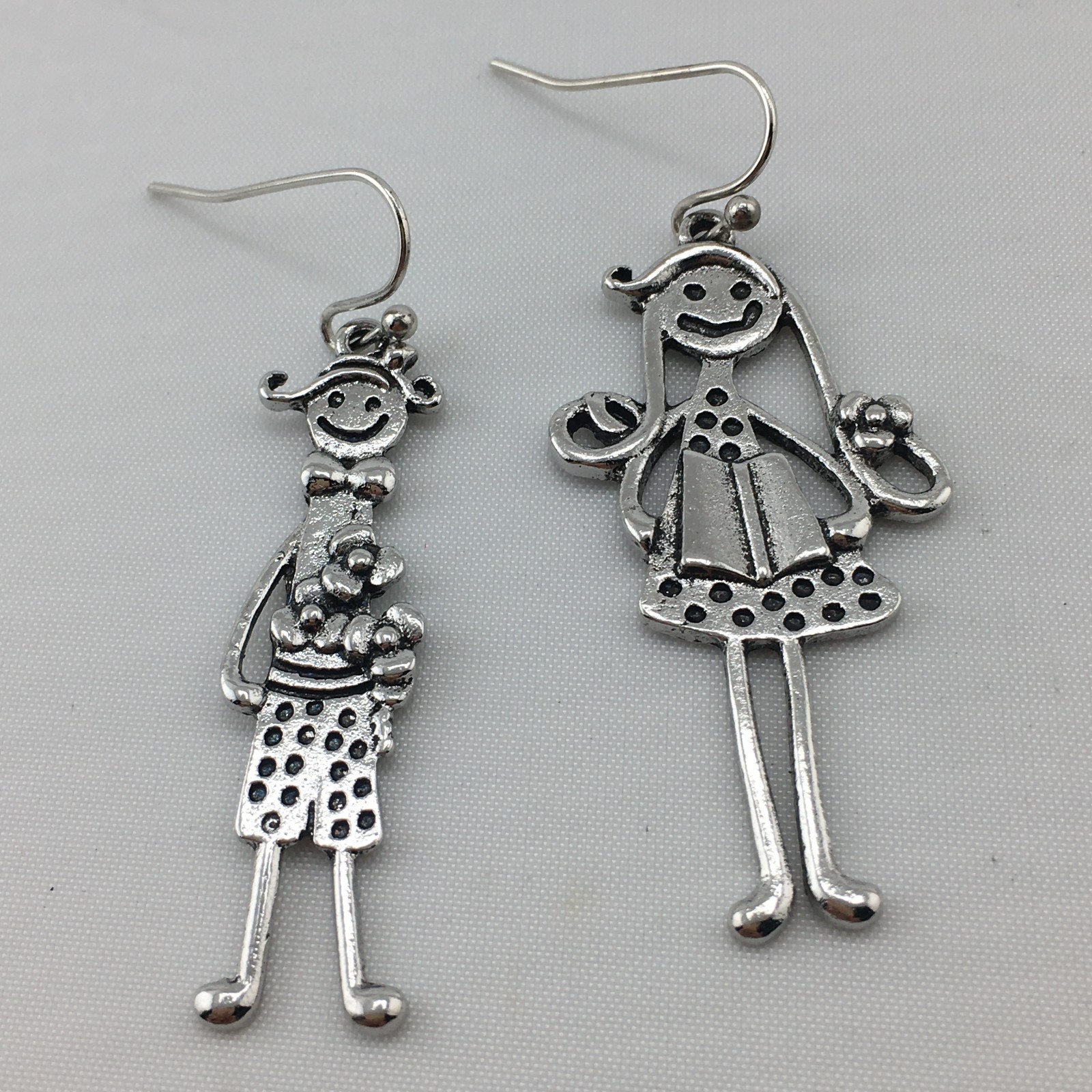 Zinc alloy boy & girl dangle earrings 2 “