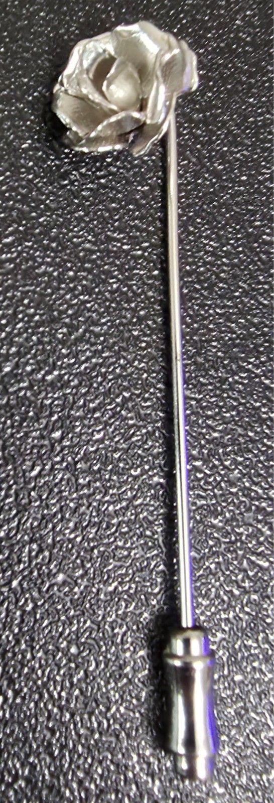 Rose Stick Pin Silver in color Unique