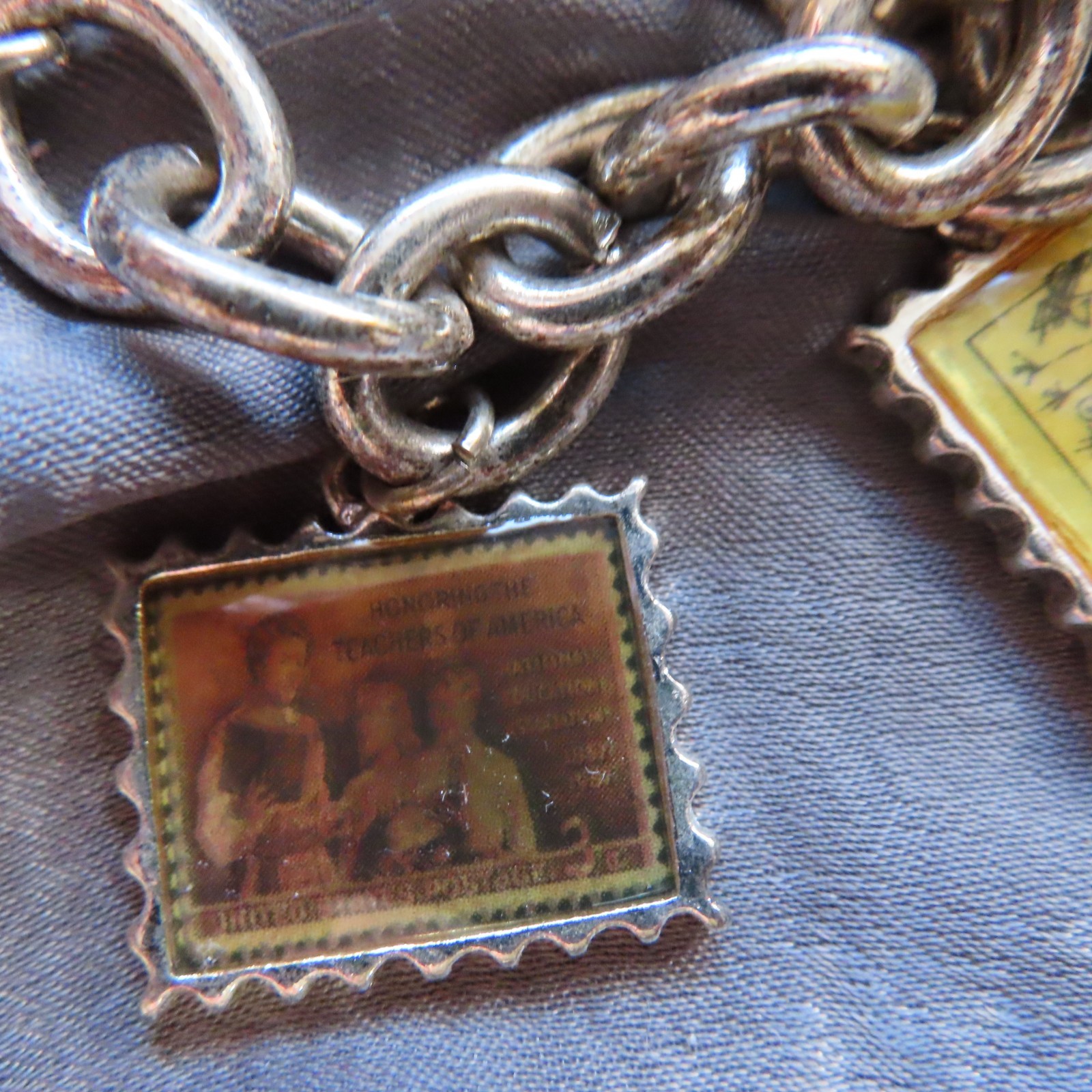 Education themed US Postal Stamp charm bracelet, silver-tone